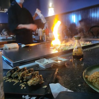 Simon's - Godzilla roll staring at flames on the grill! - Tapas Bars Near Me - Horseheads, New York