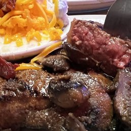 12 ounce strip steak, medium!