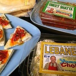 Natural Grocers - Greatest snack ever. Like, knee-buckling good. On Pita spread the lebaneh (Lebanese Cheese Spread) then top with the sweet shatta