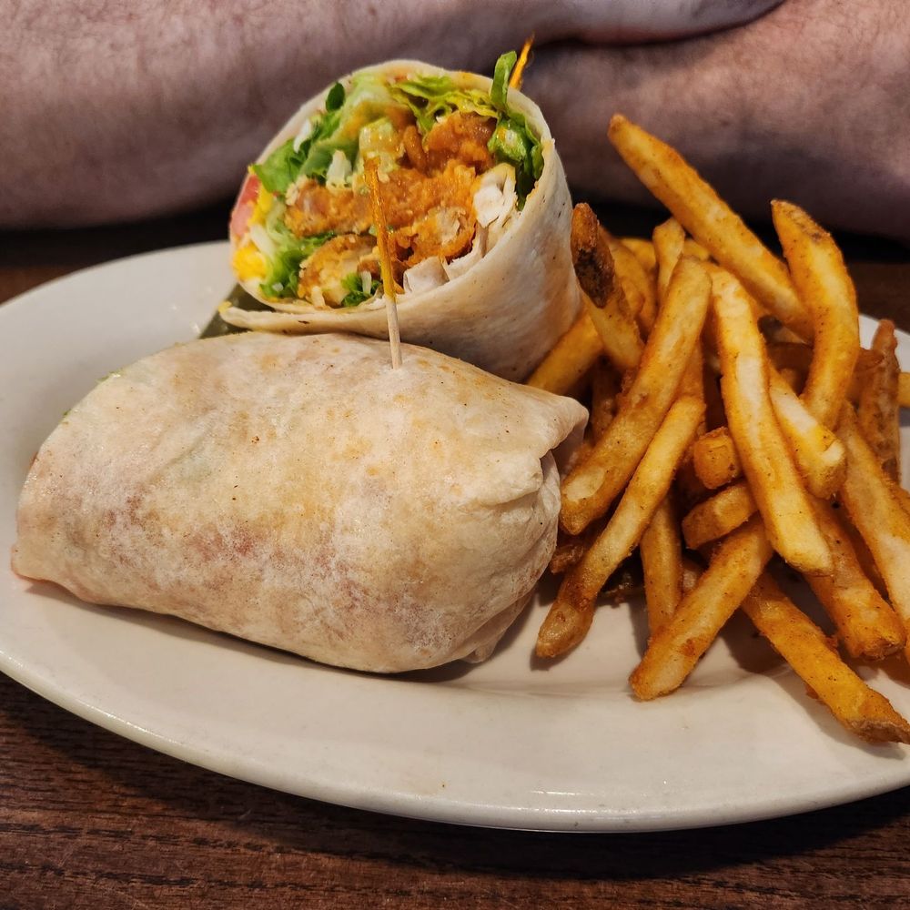 Sports Page - Buffalo chicken wrap with crispy fries - American Near Me - Arlington Heights, Illinois Sports Page - Buffalo chicken wrap with crispy fries - American Near Me - Arlington Heights, Illinois
