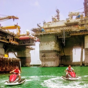 Nauticool Adventures - Customers (now friends) seeing up close and personal the offshore rigs with Nauticool Adventures in Port Aransas Texas. - Jet Skis Near Me - Corpus Christi, Texas