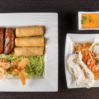 SL Kitchen - SLK Sampler.Thai or lao style papaya salad,lao sausages,egg rolls and money bags. - Thai Near Me - San Leandro, California SL Kitchen - SLK Sampler.Thai or lao style papaya salad,lao sausages,egg rolls and money bags. - Thai Near Me - San Leandro, California
