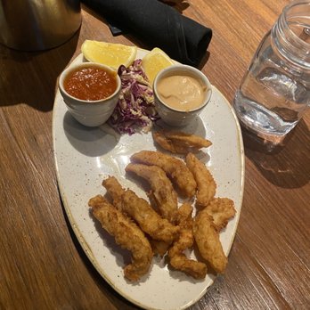 Cutthroats Saloon - Calamari appetizer with 2 pieces missing! The table all enjoyed this plate. - American Near Me - Incline Village, Nevada