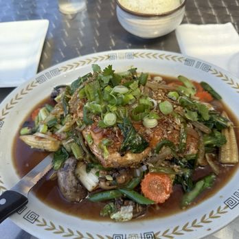 Secret Thai Kitchen - Grilled Salmon with lots of vegetables and garlic. - Thai Near Me - Freeport, New York Secret Thai Kitchen - Grilled Salmon with lots of vegetables and garlic. - Thai Near Me - Freeport, New York
