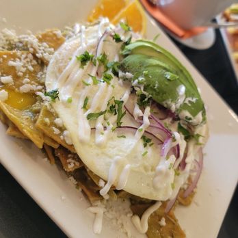 Calafia Kitchen - Green chilaquiles with  2 eggs over medium. - Breakfast & Brunch Near Me - Livermore, California