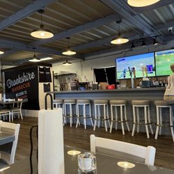Brookshire BBQ - Restaurant interior, small but nicely spaced out tables. Capacity of 40 diners or so.