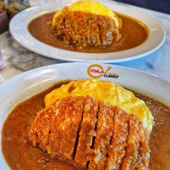 MAJI Curry - Omelet Curry with Pork Cutlet (reg - front, large - back) IG@vetteats - Japanese Curry Near Me - Irvine, California MAJI Curry - Omelet Curry with Pork Cutlet (reg - front, large - back) IG@vetteats - Japanese Curry Near Me - Irvine, California