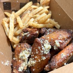 Astin J's - Garlic parm fries and wings