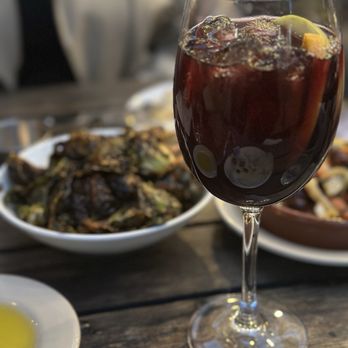 Barcelona Wine Bar Passyunk - Red sangria and brussel sprouts - Tapas/Small Plates Near Me - Philadelphia, Pennsylvania