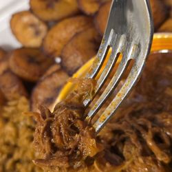 Cuban Island Restaurant - Ropa Vieja entrée. (Shredded Beef with rice & beans, and ripe, sweet plantains.