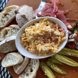 Pimiento cheese app was very good. Could have had a few more slices of bread. The sides that came with it were pickled and yummy.