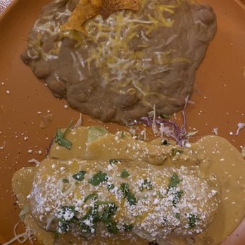 Mi Casa Restaurant - The California chimichanga with a dolphin shape tortilla chip decor. - Mexican Near Me - Benson, Arizona Mi Casa Restaurant - The California chimichanga with a dolphin shape tortilla chip decor. - Mexican Near Me - Benson, Arizona