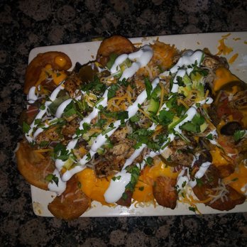 Chuck's Place - Half of an Irish Nachos order - Chicken Wings Near Me - Manteca, California Chuck's Place - Half of an Irish Nachos order - Chicken Wings Near Me - Manteca, California
