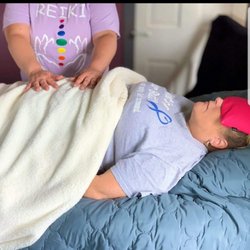 Reiki By Amy H - This is just one of a few ways a reiki session is done. You can lay on your back, side or stomach. Which ever way is comfortable for you.