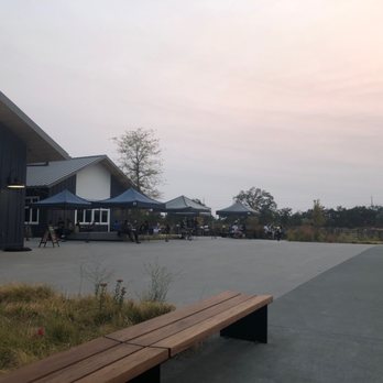 Russian River Brewing - The patio on a Friday night with social distancing and a fire sunset. - Brewpubs Near Me - Windsor, California Russian River Brewing - The patio on a Friday night with social distancing and a fire sunset. - Brewpubs Near Me - Windsor, California