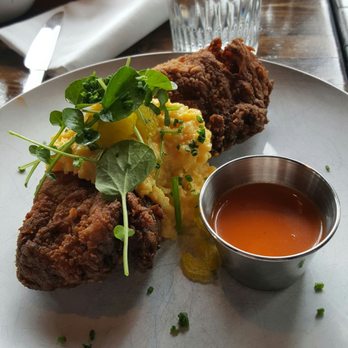Grey Ghost - Chicken fried steak for brunch, with the hot sauce on the side. Excellent dish, genuinely homemade, not greasy, excellent flavor. - American Near Me - Detroit, Michigan