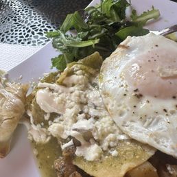 It's supposed to be Chilaquiles Salsa Roja(Spicy) but came with green sauce instead It's supposed to be Chilaquiles Salsa Roja(Spicy) but came with green sauce instead
