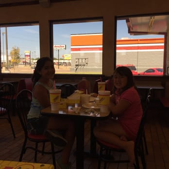 Chicken Express - two women sitting at a table - New American Near Me - Gun Barrel City, Texas Chicken Express - two women sitting at a table - New American Near Me - Gun Barrel City, Texas