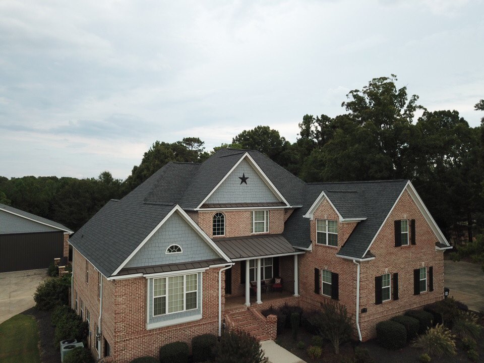 Slide of Paramount Roofing & Construction