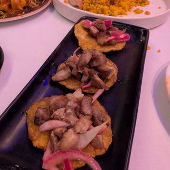 Victor's Cafe - Tostones con Masitas de Puerco - Cuban Near Me - New York, New York Victor's Cafe - Tostones con Masitas de Puerco - Cuban Near Me - New York, New York