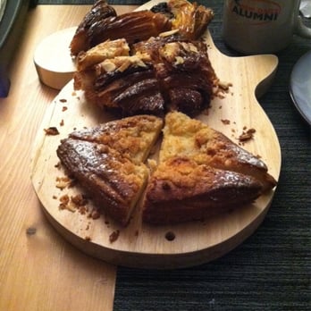 Bien Cuit - The pastries. (Front to back) apple cardamom tart, chocolate almond croissant, huckleberry tart. - Bakeries Near Me - Brooklyn, New York