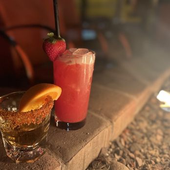 The Z Bar - a drink and a strawberry on a table - Cocktail Bars Near Me - Reno, Nevada The Z Bar - a drink and a strawberry on a table - Cocktail Bars Near Me - Reno, Nevada