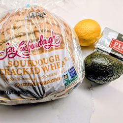Raley's - My favorite sourdough from my favorite grocer! Plus, a perfectly ripe avocado, a Meyer lemon, and some nice butter. Ready for many toasts!