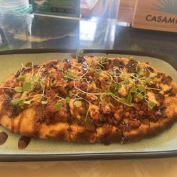 Fig, bacon, onion and blue cheese flatbread . Fig, bacon, onion and blue cheese flatbread .