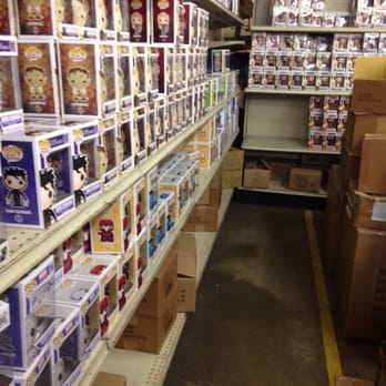 Tom's Model - I wish I got a better picture but I was just so excited to keep looking. This is just an example of the funko pop shelves! - Hobby Shops Near Me - Los Angeles, California