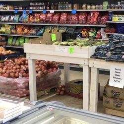 Bargain Corner Berryville Arkansas - Some of there fresh vegetables. 3lb onions today $1.25.