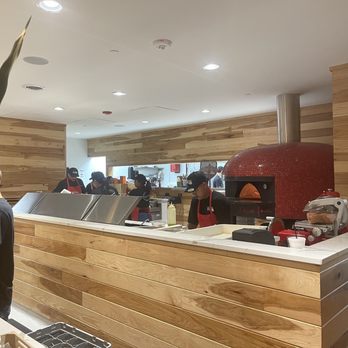 Gia Mia - Kitchen area with the staff doing their thing!! Check out the brick oven. (That's where the pizza magic happens).......... - Italian Near Me - Naperville, Illinois