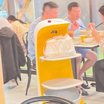 Laksa King - Robots delivering food in doggie bag - Malaysian Near Me - Glen Waverley, VIC