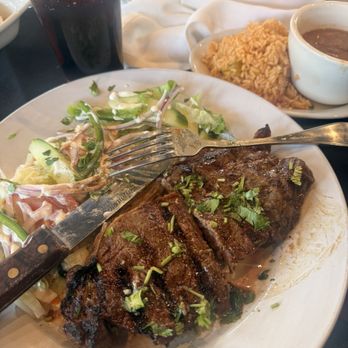 El Aguila - Steak A La Salvadorena: Sirloin with a side of Rice and Beans (pinto beans) and salad - Tex-Mex Near Me - Silver Spring, Maryland
