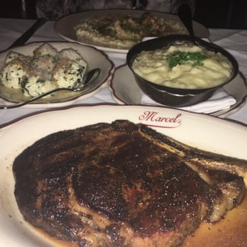 Marcel - 22 oz ribeye (wish it was seasoned a little better and more tender) but still good.mashed potatoes and spinach gnudi - Steakhouses Near Me - Atlanta, Georgia Marcel - 22 oz ribeye (wish it was seasoned a little better and more tender) but still good.mashed potatoes and spinach gnudi - Steakhouses Near Me - Atlanta, Georgia