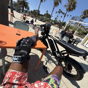 Saltwater Deck - Me sitting with injury leg thinking I was going to get food I paid for... but no. - New American Near Me - Long Beach, California Saltwater Deck - Me sitting with injury leg thinking I was going to get food I paid for... but no. - New American Near Me - Long Beach, California
