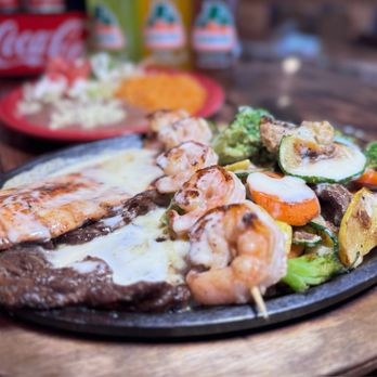 El Cazador Mexican Grill - El Cowboy. Grilled steak and Chicken ( add grilled shrimp.. optional ) served with California Veggies. Rice and Beans. Tortillas - Mexican Near Me - Appomattox, Virginia El Cazador Mexican Grill - El Cowboy. Grilled steak and Chicken ( add grilled shrimp.. optional ) served with California Veggies. Rice and Beans. Tortillas - Mexican Near Me - Appomattox, Virginia