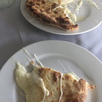 Kavkaz - Khachapori with cheese ($12) - Armenian Near Me - North Miami Beach, Florida Kavkaz - Khachapori with cheese ($12) - Armenian Near Me - North Miami Beach, Florida
