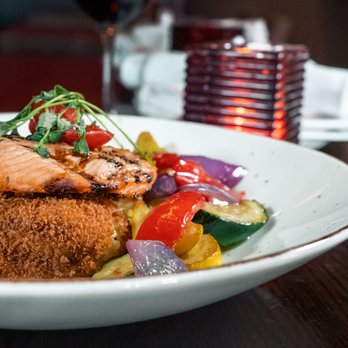 The Waverley - a plate of food and a glass of wine - Gastropubs Near Me - Ottawa, Ontario