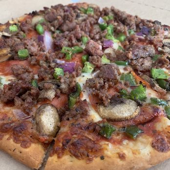 Sugar River Pizza - Amazon Deluxe on thin crust - good red sauce and lots of ingredients. - Pizza Near Me - Verona, Wisconsin