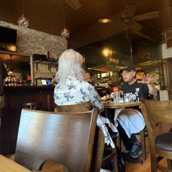 Looking back at the open kitchen area next to the bar.