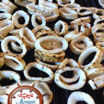 Morgan - grilled squid rings on a grill - Seafood Near Me - Dollard-des-Ormeaux, Quebec Morgan - grilled squid rings on a grill - Seafood Near Me - Dollard-des-Ormeaux, Quebec