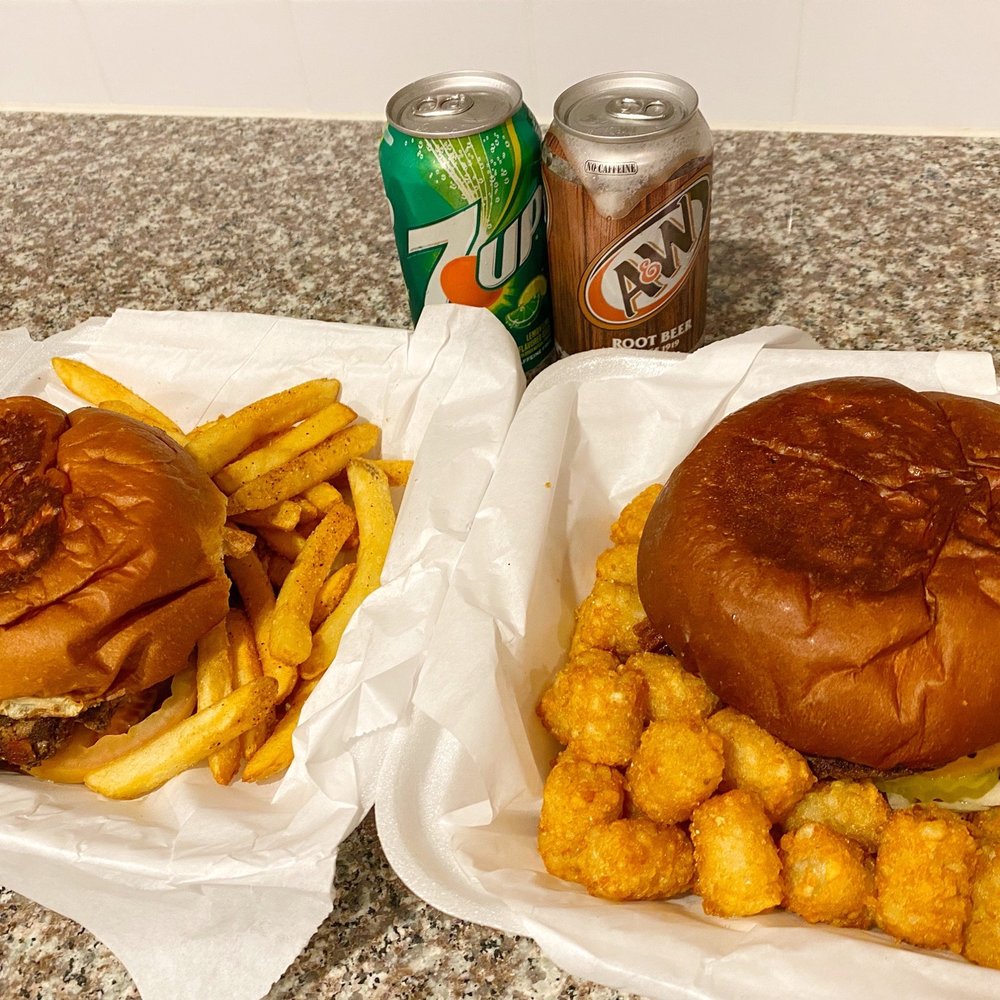 JLB Eatery - Picture next to soda cans for size comparison... The burgers are huge!!! - Burgers Near Me - Tomball, Texas JLB Eatery - Picture next to soda cans for size comparison... The burgers are huge!!! - Burgers Near Me - Tomball, Texas