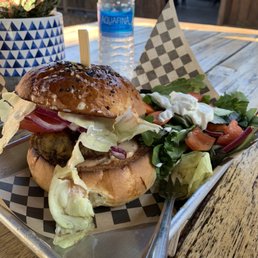 Juicy Lucy with side salad. Bottom of bun bigger than the top and ridiculously hard to eat