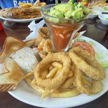 Muelle 37 - a plate of food on a table - Seafood Near Me - Donna, Texas Muelle 37 - a plate of food on a table - Seafood Near Me - Donna, Texas