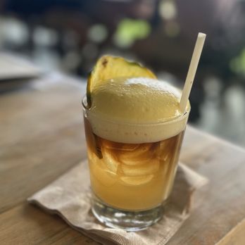 Monkeypod Kitchen - Mai Tai with Lilikoi froth on top - New American Near Me - Lahaina, Hawaii Monkeypod Kitchen - Mai Tai with Lilikoi froth on top - New American Near Me - Lahaina, Hawaii