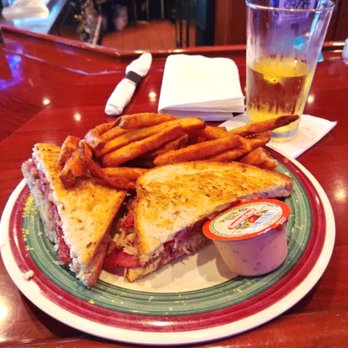 Houligan's Destination Daytona - Corned beef Reuben with seasoned fries - New American Near Me - Ormond Beach, Florida