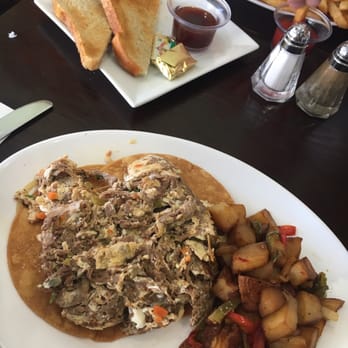 The Chef's Corner - Breakfast special - scrambled eggs and flank steak with queso fresco - New American Near Me - Mineola, New York