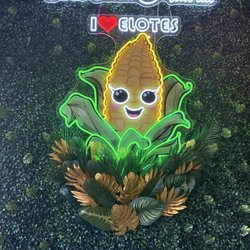 The cute light up corn sign and their business name!