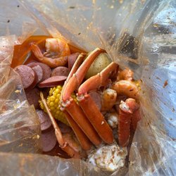 The Twisted Crab - Hampton - T1 - (1/2 Lb Snow Crab Legs, 1/2 Lb Shrimp W. No Head, 1/2 Lb Sausage) with Hot Creole/Twisted Sauce