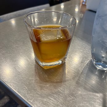 Renaissance Austin Hotel - Glass of Whiskey at the bar - Hotels Near Me - Austin, Texas Renaissance Austin Hotel - Glass of Whiskey at the bar - Hotels Near Me - Austin, Texas